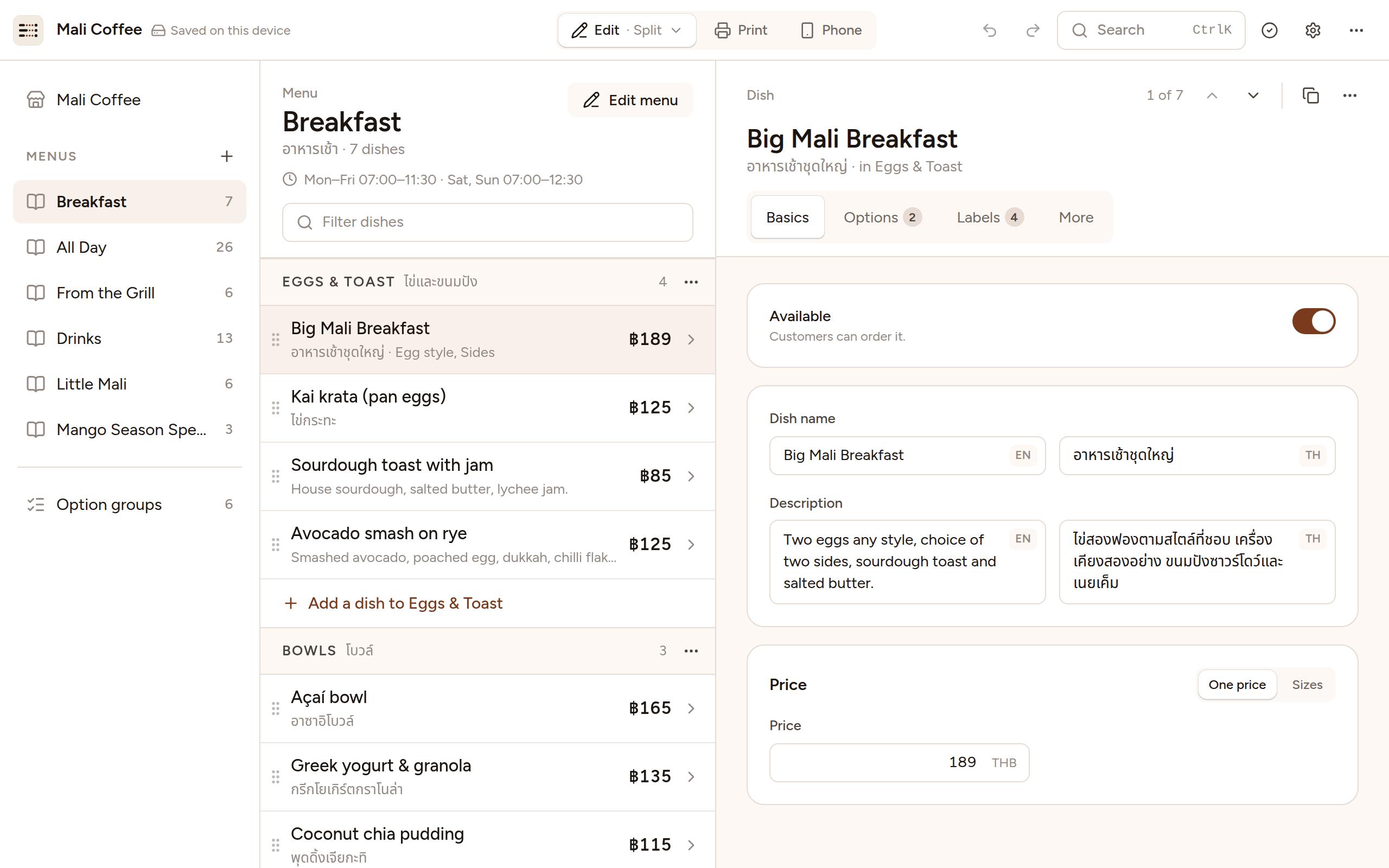 Screenshot of the Menu Studio editor with the sample menu open: the shop and its menus on the left, the menu’s dishes section by section in the middle, and the selected dish open beside them, with its English and Thai names side by side, its description, availability and price.