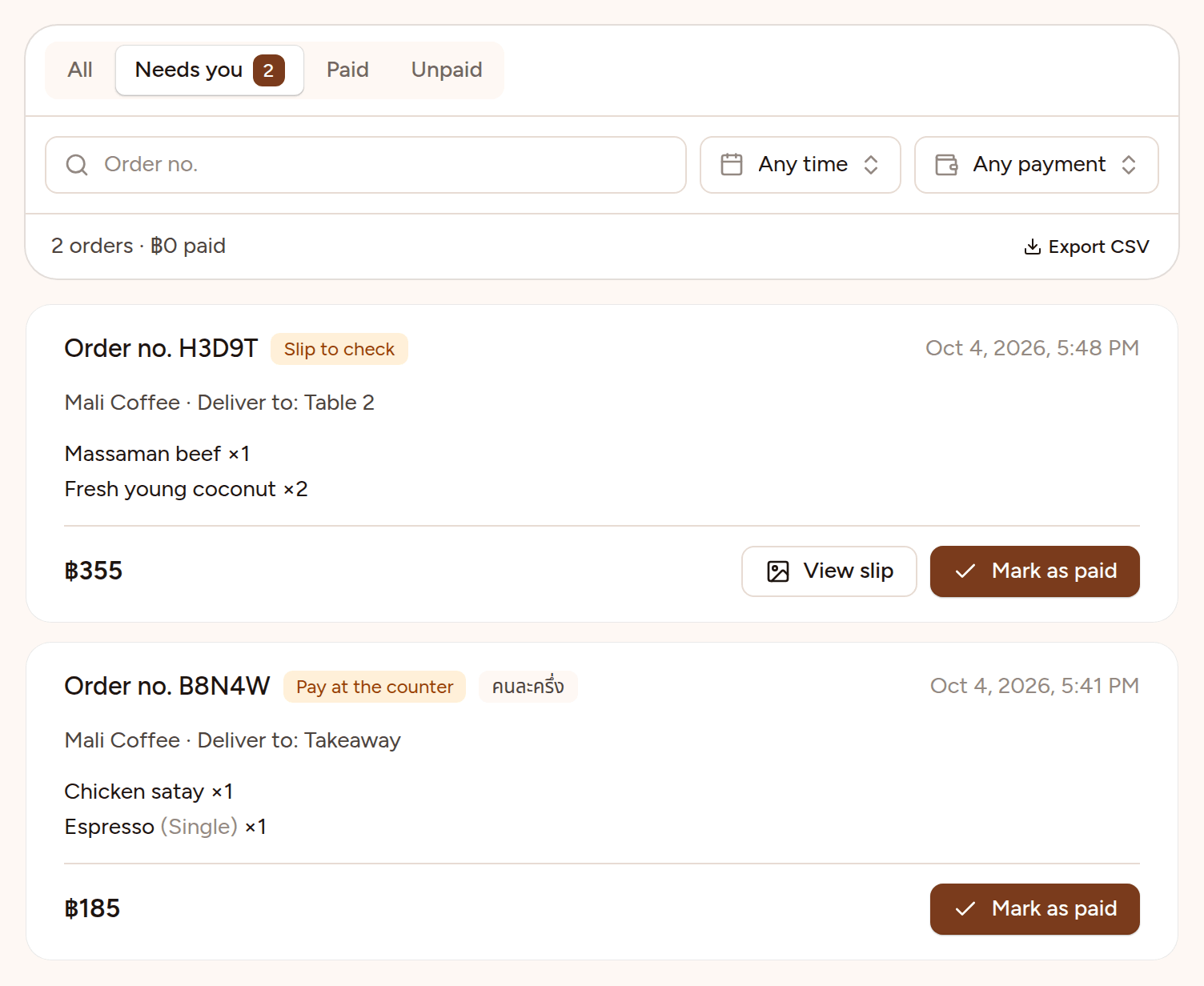 The Orders page on the Needs you tab, which shows 2: a QR order marked Slip to check with View slip and Mark as paid buttons, and a คนละครึ่ง order marked Pay at the counter with a Mark as paid button.